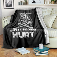 Black throw blanket draped over sofa with skull graphic and 'I CAN FIX STUPID' text