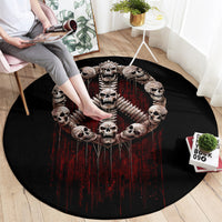 Black round rug with skull, ribcage, and winged angel graphic