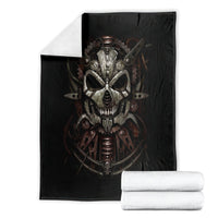 Black mechanical skull blanket with illustrated center skull, neatly folded