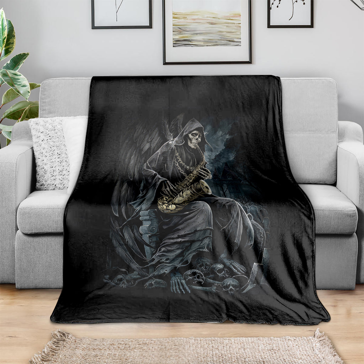 Black skull musician throw blanket laid on sofa, skeleton graphic with instrument