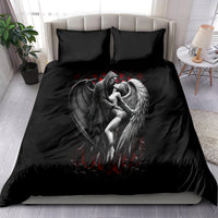 Black bedding set on bed: duvet cover with angel-wing graphic, with 2 pillowcases