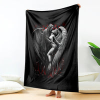 Black angel and skull graphic blanket with winged figure and red accents