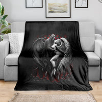 Black throw blanket featuring winged angel couple graphic with red details