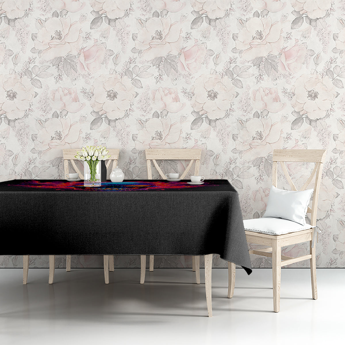 Black skull tablecloth with colorful flame skull artwork on dining table