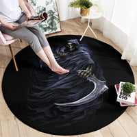 Round black rug featuring a grim reaper skull and scythe illustration