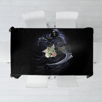 Black skull and reaper graphic tablecloth with purple-toned artwork, centered across surface
