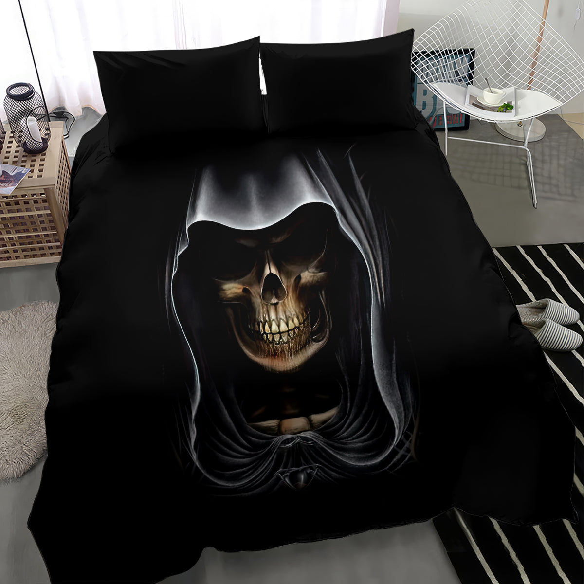Black double bedding set with hooded skull angel artwork centered on the duvet