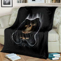 Black skull graphic blanket spread on a bed, large skull and veil motif