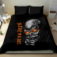Black bedding set with skull face print and orange Ride Or Die lettering, duvet centered on bed