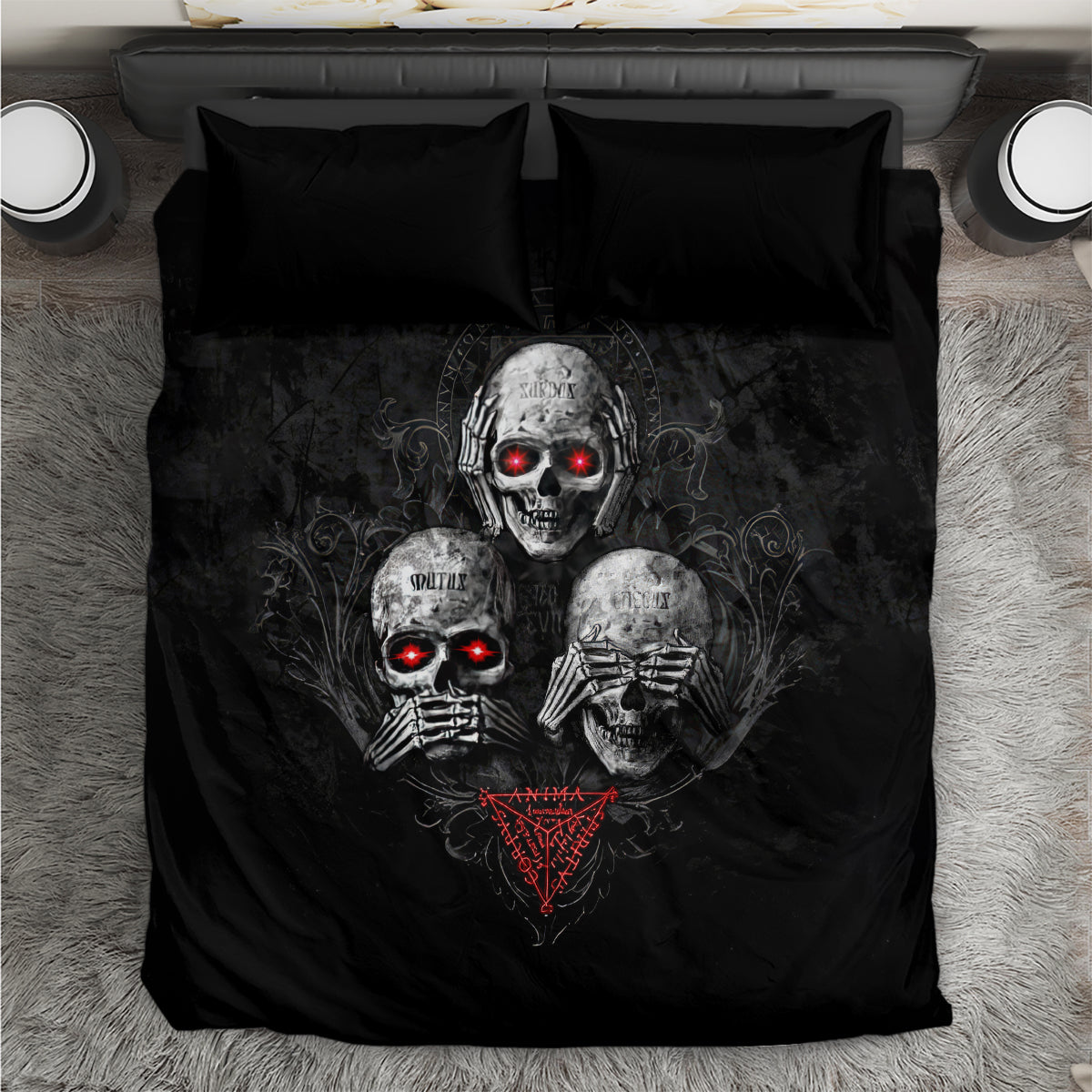 Black skull-themed bedding set with two pillows, red glowing eyes and heart emblem