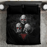 Black skull-themed bedding set with two pillows, red glowing eyes and heart emblem