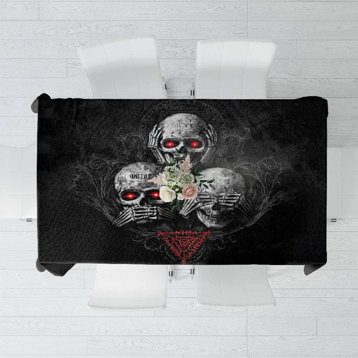 Black skull graphic tablecloth with red-eyed skull design, rectangular table cover.