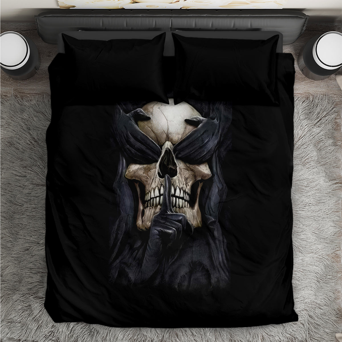 Black skull bedding set, top-down view, centered skull and hands graphic with pillows