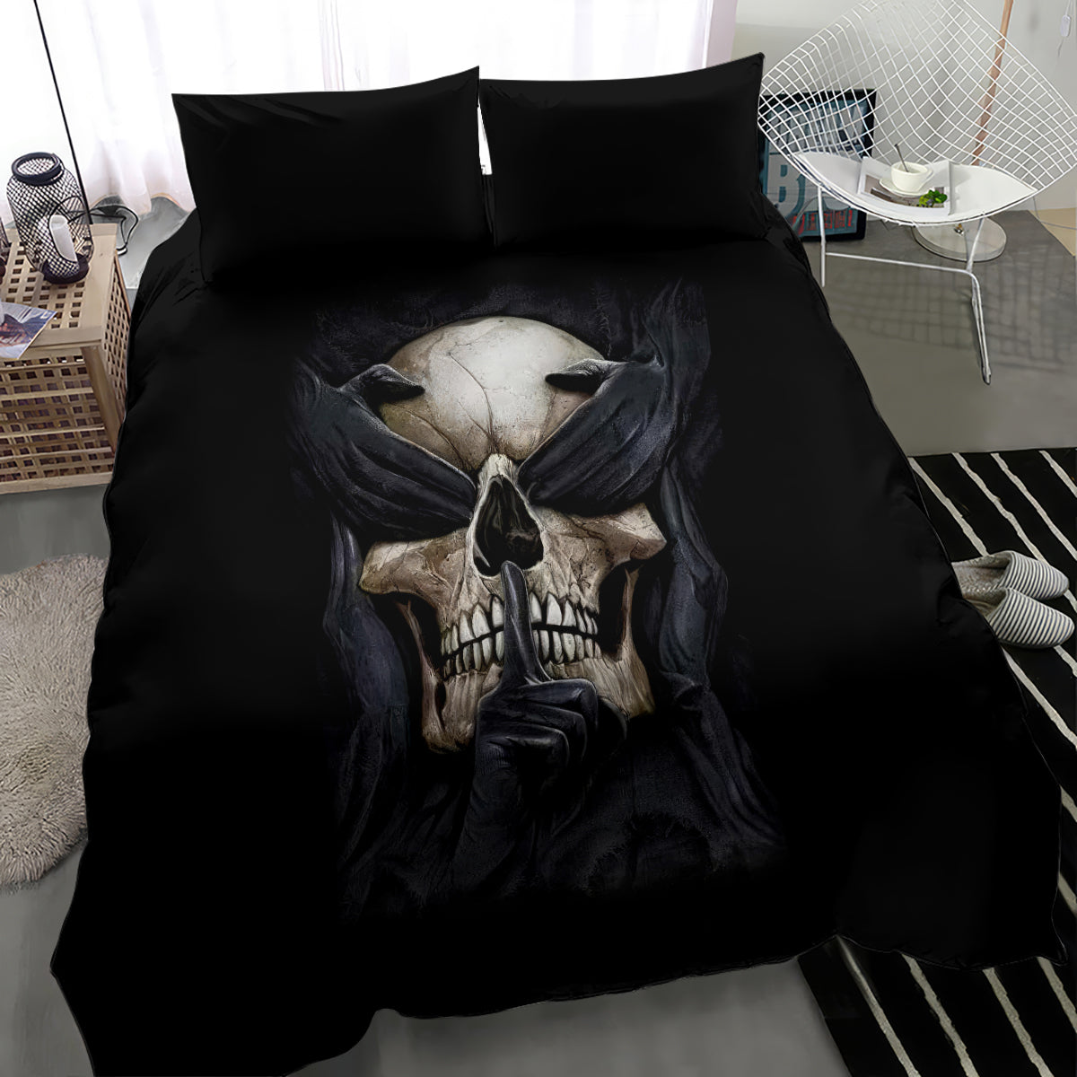 Black skull bedding set featuring a large skull graphic centered on the comforter