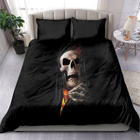 Black bedding set featuring a skull face with orange flames and ripped fabric center