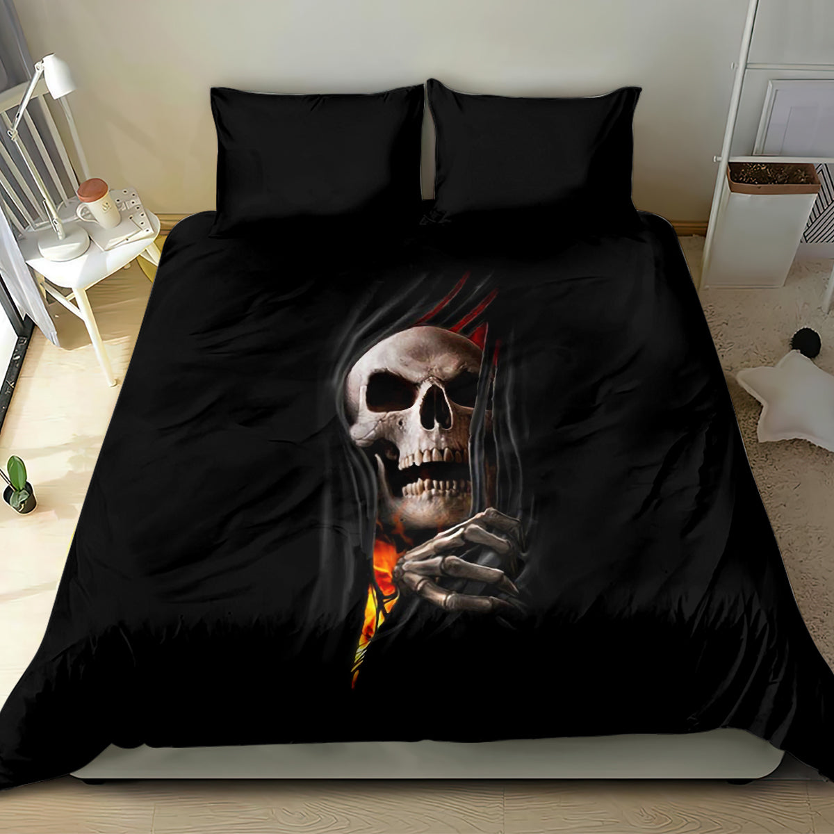 Black bedding set with skull artwork, hands motif, and flame stripe down the middle