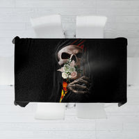 Black tablecloth with skull-and-flame graphic and ripped edges