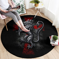 Round black rug with detailed gray lion graphic, sword, and red accents