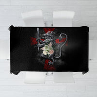 Black tablecloth with detailed skull and red-gray crest graphic in center