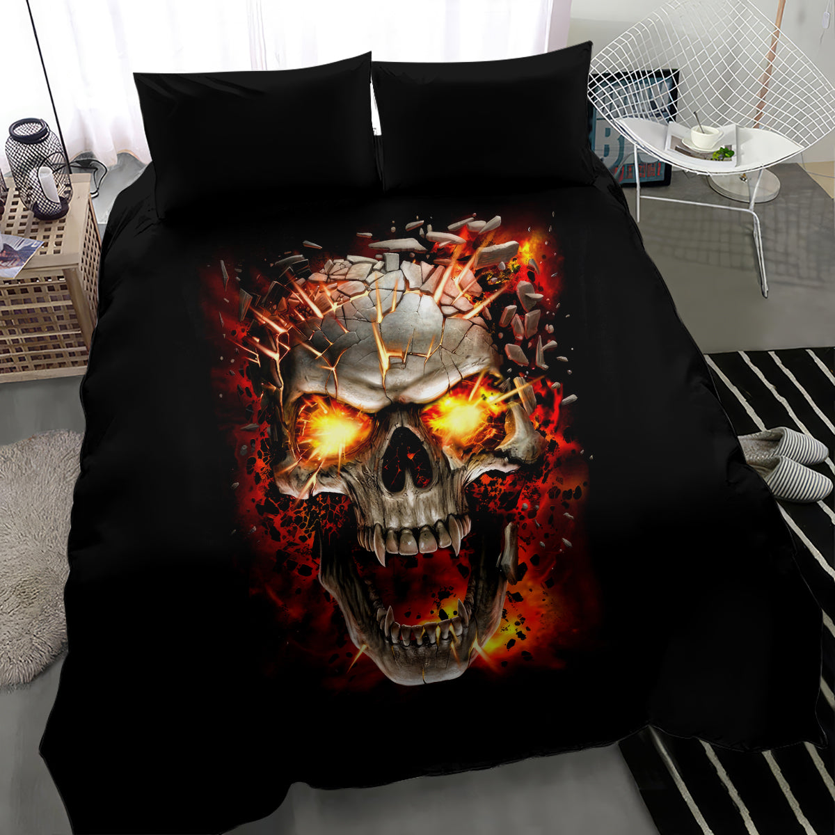 Black skull bedding set with large flaming skull artwork centered on duvet and pillows