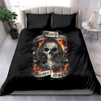 Black bedding set with flaming skull artwork on duvet and two matching pillow shams
