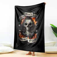 Black skull graphic blanket with flaming skull design, banner-style print