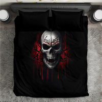 Black bedding set with centered gray skull face and red dripping design, flat sheet front