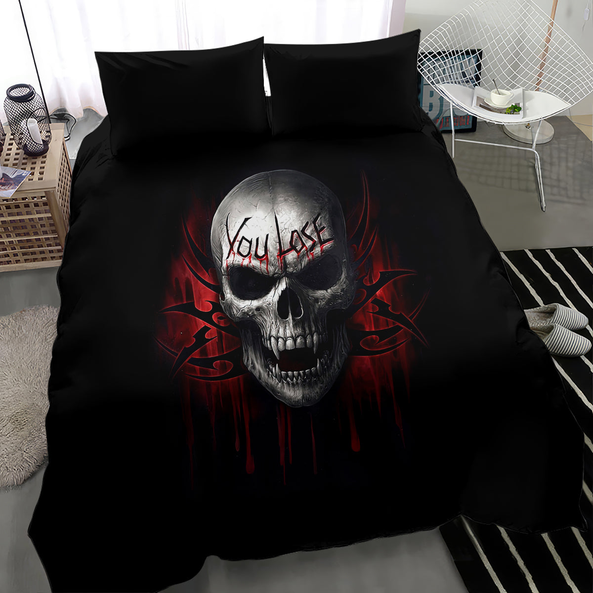 Black bedding set featuring gray skull print with red flames, duvet and two pillows