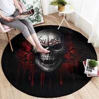 Round skull graphic carpet, black with red dripping flame design