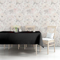 Black skull graphic tablecloth on a dining table, corner view