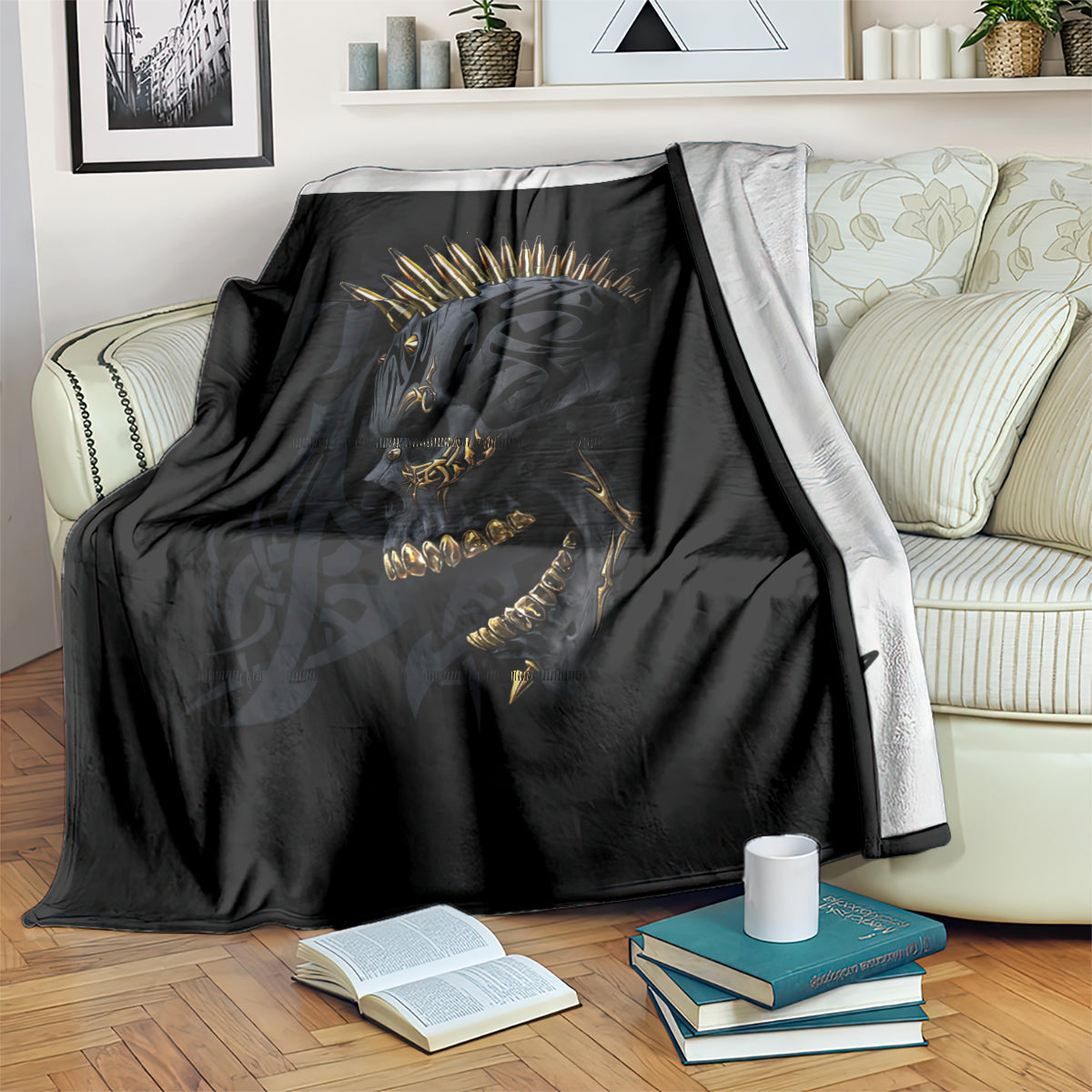 Black skull gang blanket on bed with open book, golden crown and chain artwork