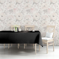 Black tablecloth on dining table with skull girl motif near the front edge