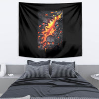 Black skull tapestry with flame artwork, draped above a bed