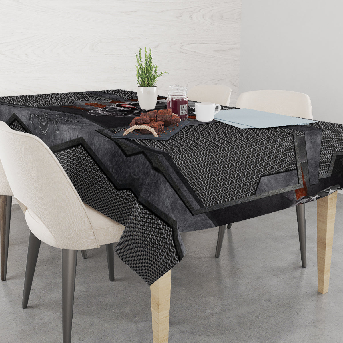 Black skull tablecloth with textured zigzag pattern and central head graphic