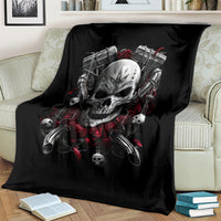 Black skull riding biker girl blanket draped on sofa, featuring bold skull and red roses