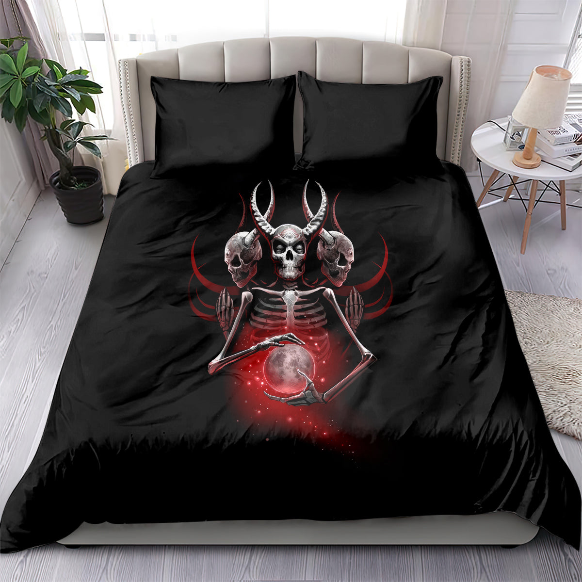 Black skull prayer bedding set on bed with two pillow shams and central red skull graphic