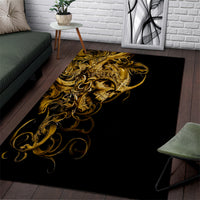 Black and gold skull area rug with ornate swirling design, rectangular