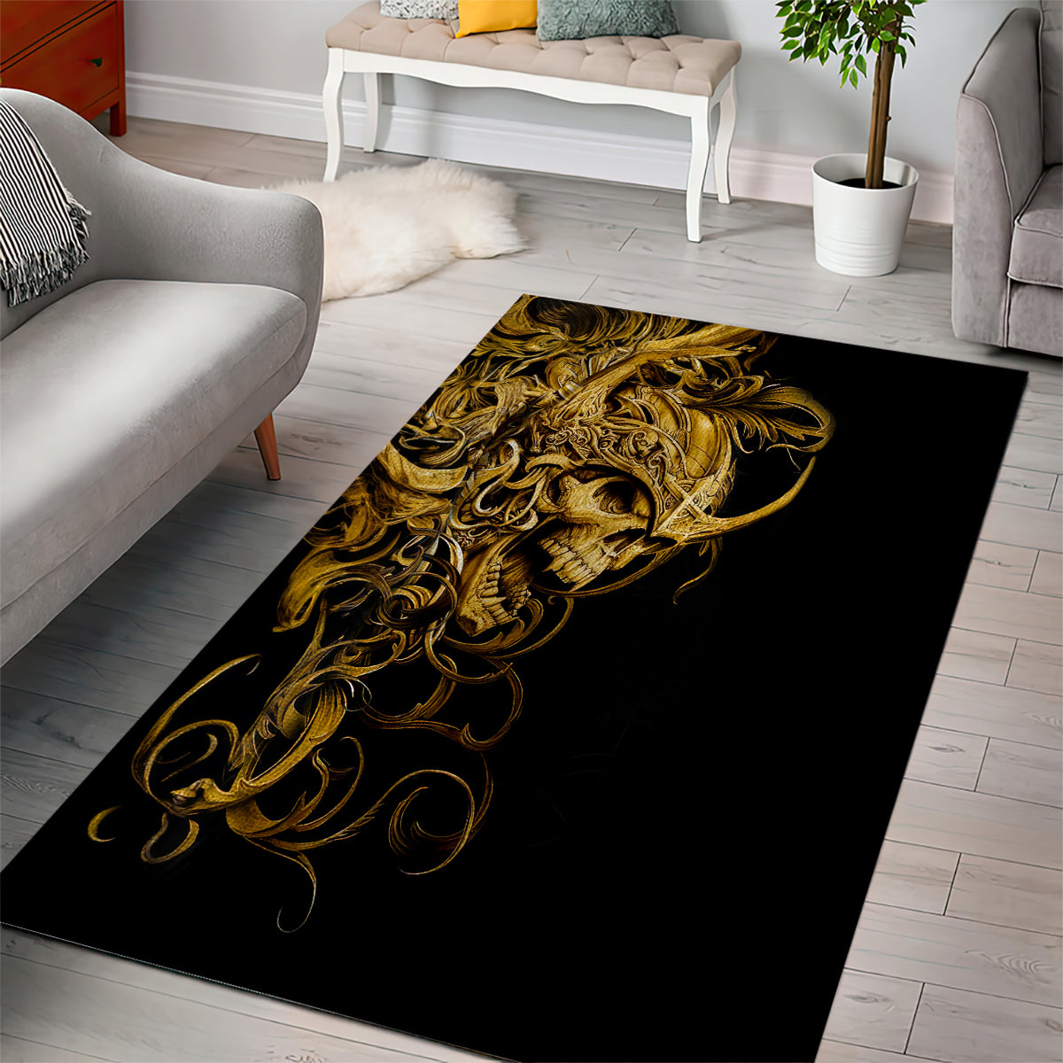 Rectangular black and gold skull area rug with detailed ornamental swirls