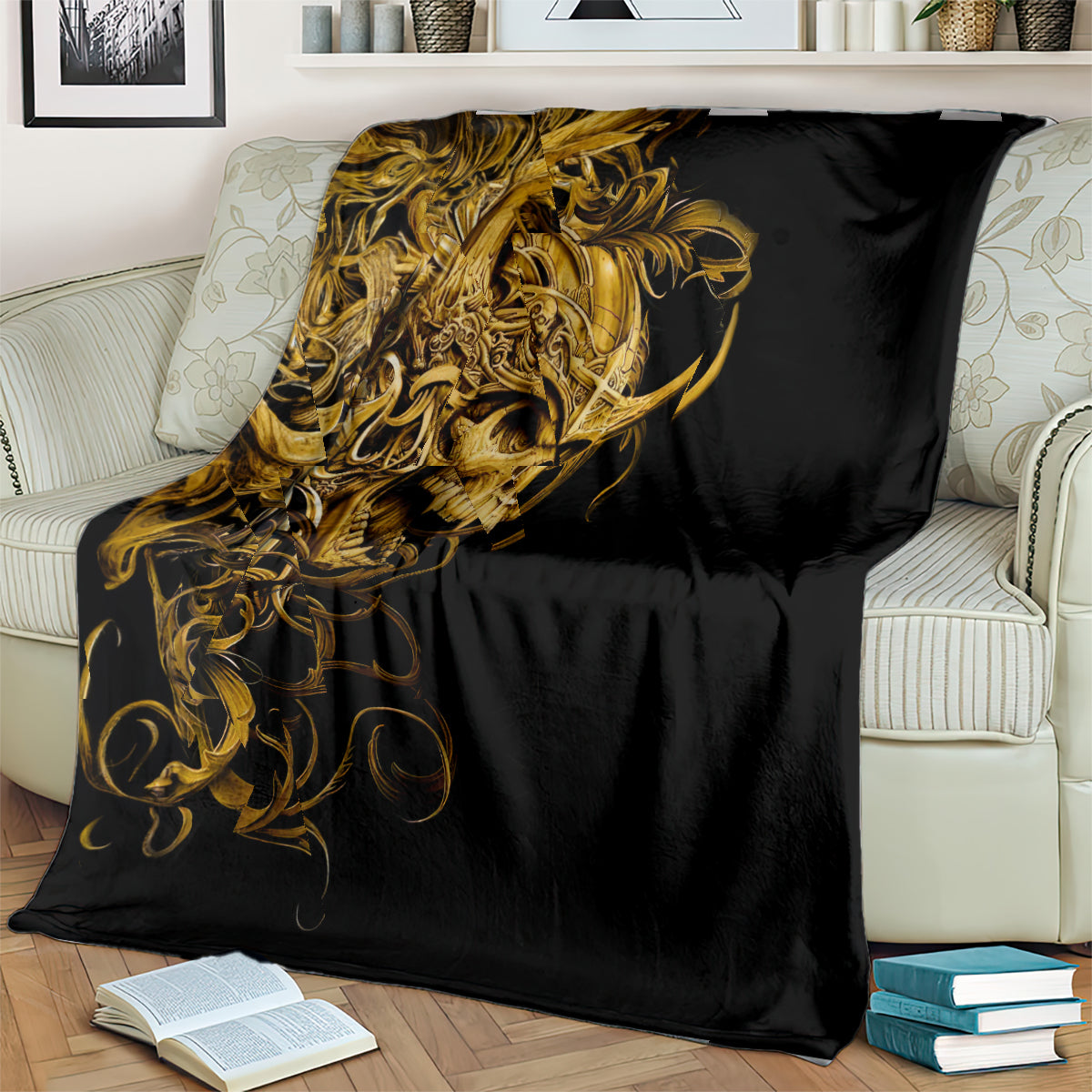 Black skull blanket with gold warrior skull design, draped across couch