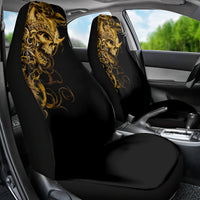 Black front seat covers with gold ornate skull design and fitted headrest panels