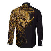Black long-sleeve button shirt with gold skull-and-scroll graphic on back