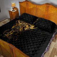 Black quilt bed set with gold skull motif on quilt, diamond stitched texture and two pillows
