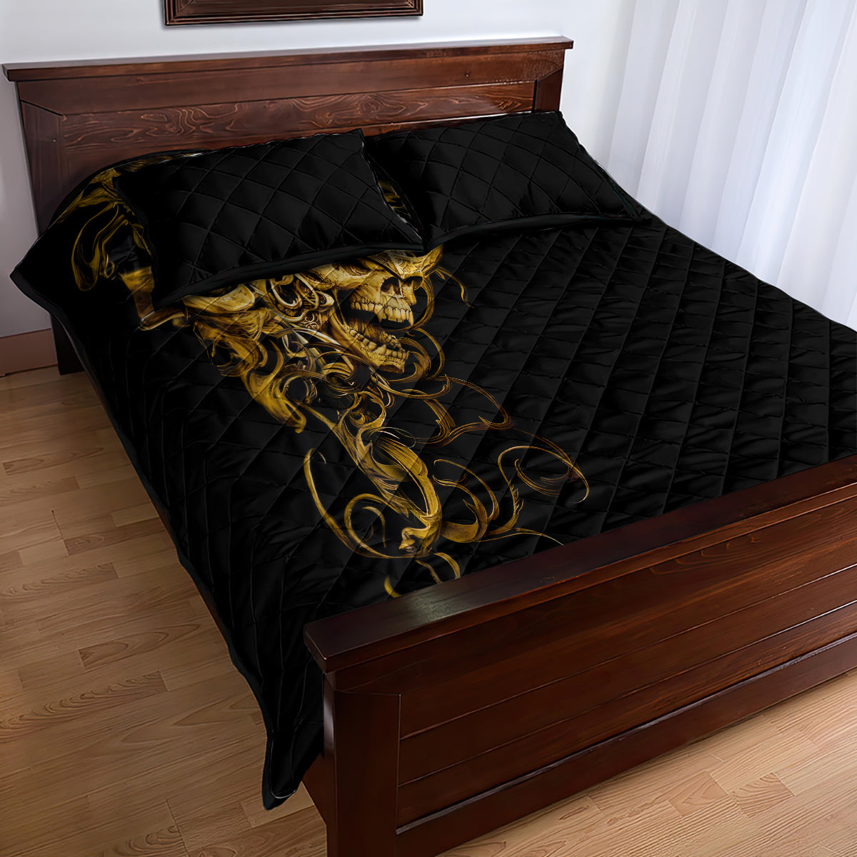 Black quilt bed set with gold skull artwork, diamond quilted comforter and two matching pillows