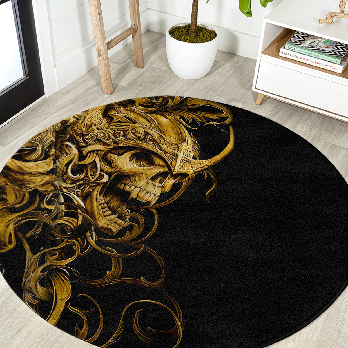 Round black area rug with gold skull warrior portrait and ornate swirl pattern