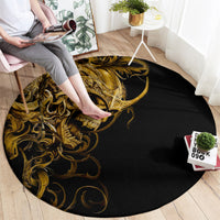 Round black rug with gold skull warrior graphic and swirling ornamental details