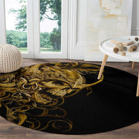 Round black rug with gold skull warrior artwork and swirling filigree accents
