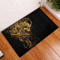 Black rubber doormat with gold ornate skull warrior graphic