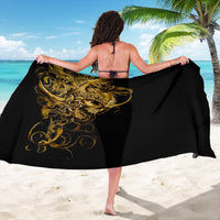 Black sarong with gold skull graphic, tied waist wrap over hips