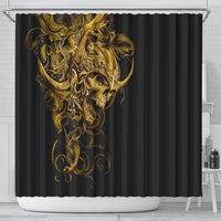 Black shower curtain featuring a large golden skull and armor artwork with swirling accents