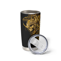 Black tumbler cup with gold skull warrior design, clear lid shown next to it.